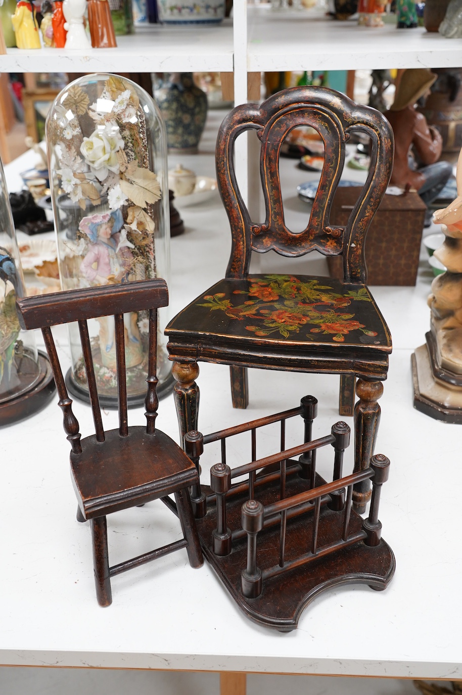 Two miniature single chairs and a spindle turned stationery rack, largest 45cm high. Condition - fair, largest chair repaired